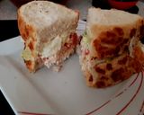 A picture of step 2 of My Tigerbread Sandwich fresh chicken, tomatoes sliced, + more 😘.