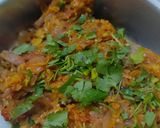 A picture of step 9 of Winter special big size brinjal bartha.