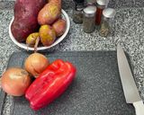 Foto del paso 2 de la receta: Pollo marinado y verduras al horno