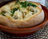 Foto del paso 7 de la receta: Bacalao a la sidra en hogaza de pan