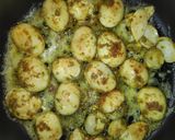 A picture of step 5 of Masala eggs.