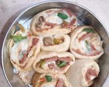 A picture of step 9 of Pizza Pinwheels.