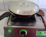 A picture of step 12 of Shahi Chicken Rezala.