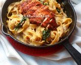A picture of step 9 of Chicken fettuccine pasta in white sauce.