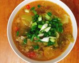 Hình bước làm 6 của món Canh cải chua nấu bò