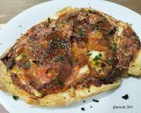Foto del paso 5 de la receta: Pizza-naan de magreta y cebolla a la naranja en airfryer