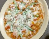 A picture of step 4 of Thin crust Cheese burst Pizza.