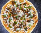 A picture of step 4 of Thin crust chicken shrimp pizza (stovetop).