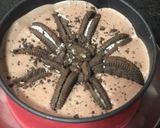 A picture of step 9 of Eggless: Oreo Chocolate Vanilla Ice Cream Cake.