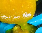 A picture of step 2 of Orange pudding with dash of tutti frutti.