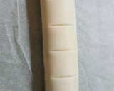 Foto del paso 4 de la receta: Bollo de hojaldre con frankfurt y queso