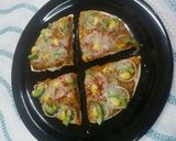 A picture of step 7 of Cheesey Pav Bhajji Pizza.