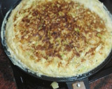 Foto del paso 8 de la receta: Tortilla de papas con cebolla y calabacín rallado