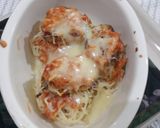 A picture of step 12 of Cheesy Noodles with Dumplings.