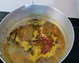 A picture of step 2 of Whole Green Moong And Chana Daal Curry.