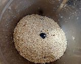 A picture of step 2 of Sesame and Walnut Ladoo.