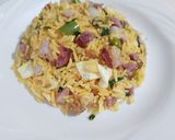 A picture of step 9 of Rice with Smoked Pork Loin, Egg, and Corn.