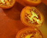 A picture of step 2 of Roasted Tuna Stuffing in a Tomato.