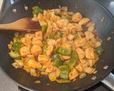 A picture of step 7 of Spicy Thai Basil Chicken.