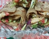 A picture of step 11 of Egg paratha roll.