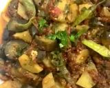 A picture of step 9 of Achari Aloo Baingan.