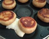 A picture of step 4 of Cheese Bombs in Pancakes Pan.