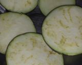 A picture of step 1 of Chana dal rice with begun bhaja.
