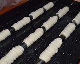 Foto del paso 4 de la receta: Cañoncitos de hojaldre con pastelera