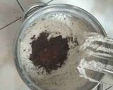 A picture of step 12 of Monster Oreo Cake with Oreo Buttercream Frosting.