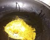 A picture of step 1 of Karonde and green chilli chunki hui.