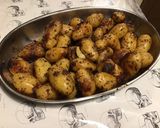 Une image de l'étape 9 de Pommes grenailles rôties en cocotte à l'ail, oignon de roscoff et herbes de Provence.