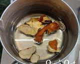 A picture of step 1 of Grapefruit Peels and Palm Jaggery Tea.