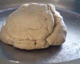 A picture of step 2 of Tandoori roti on tawa.