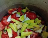 A picture of step 1 of Rich Tomato and Pumpkin Soup.