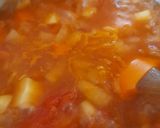 A picture of step 3 of Parsnip,carrot and tomato soup.