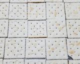 A picture of step 2 of Candied bacon crackers.