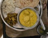 A picture of step 6 of Achari alu kadi rice.