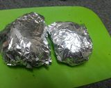 A picture of step 1 of Easy Cheesy Baked Potatoes with Hotdog Sausages.