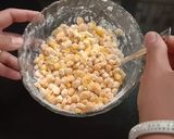 A picture of step 2 of Crispy Corn.
