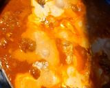 A picture of step 7 of Coconut Chicken Curry.