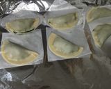 Foto del paso 12 de la receta Empanadillas de espinacas, piñones y pasas