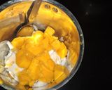 A picture of step 1 of Mango Coconut Smoothie.