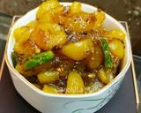 A picture of step 8 of Khatti Meethi Amla Launji.