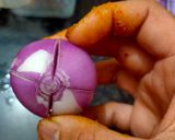 A picture of step 1 of Stuffed onion masala.