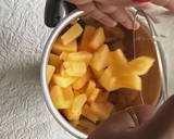 A picture of step 1 of Mango melon smoothie .