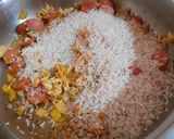 Foto del paso 4 de la receta: Arroz con pollo y salchichas a mi manera