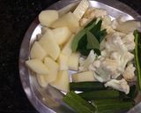 A picture of step 1 of Sindhi kadi chawal.