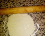 A picture of step 7 of Homemade pizza with minced beef and cheese topping.