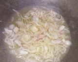 A picture of step 1 of Termeric rice.