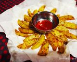 A picture of step 1 of Baked potato wedges recipe.